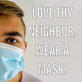 Love Thy Neighbor. Wear a Mask. Young man wears a surgical mask.